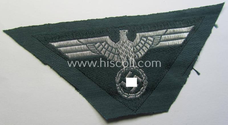 Superb, later-war-period WH (Heeres) officers'-pattern so-called: 'M44'-pattern- and/or: trapezoid-shaped breasteagle ie. 'Brustadler für Offiziere des Heeres' (being a darker-green-coloured example that comes in a 'virtually mint' condition)