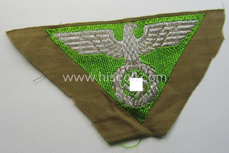 SA-related cap-eagle as was intended for the: 'Lagermütze' (ie. side-cap) being an example as woven in bright-green on a brownish-coloured background and as such intended for members within the: 'SA-Gruppe Pommern o. Thüringen'