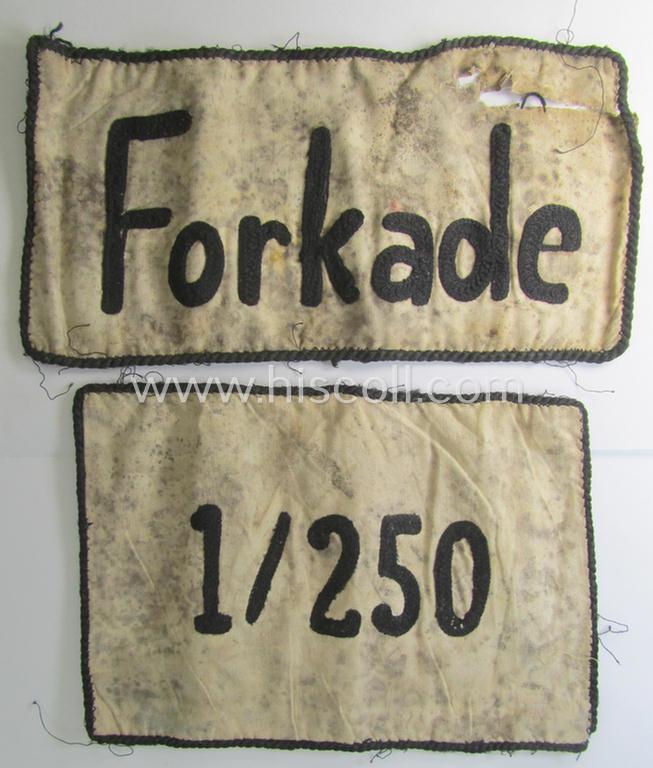 Interesting, 2-pieced set comprising of two 'patches' that saw usage onto a HJ- ie. DJ-'Gefolgschaftsfahne' showing the machine-stitched name 'Forkade' and/or unit-numerals: '1/250' and that come both in a clearly used- ie. relic, condition