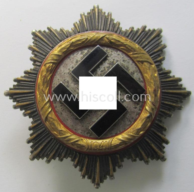 Superb, maker- (ie. '20'-marked-) example of WH (Heeres, Luftwaffe etc.) 'Deutsches Kreuz im Gold' (or DKiG ie. German Cross in gold) being a (regular- ie. 'light-weight') piece that was produced by the: 'C.F. Zimmermann'-company