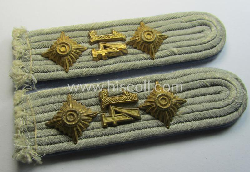Attractive - and fully matching! - pair of WH (Heeres) neatly 'cyphered', officers'-type shoulderboards as piped in the bright-blue-coloured branchcolour as was intended for a: 'Hauptmann des Fahr-Abeilungs 14'