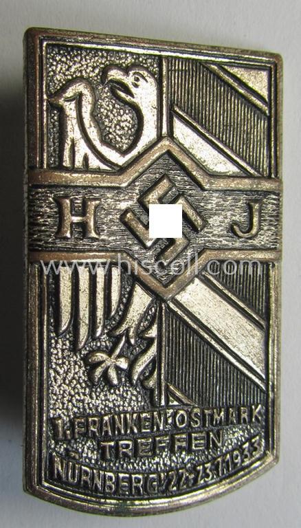 Bright-silver-toned, HJ- (ie.'Hitlerjugend'-) related 'tinnie' (ie. 'Veranstaltungsabzeichen') being a non-maker-marked example that is showing the text: '1. Franken-Ostmark Treffen - Nürnberg - 22.23.7.1933'