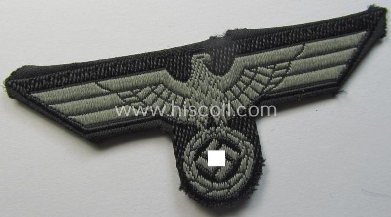 Neat, WH (Heeres) later- (ie. mid-war-) period- and/or bluish-grey-coloured 'Panzer'-type side-cap-eagle a executed in the neat 'BeVo'-weave pattern on a black-coloured background