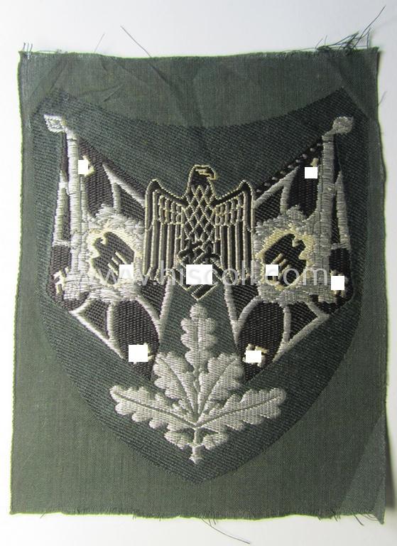 Superb - and scarcely encountered! - WH (Heeres), flat-wire- (ie. 'BeVo'-) woven 'Ärmelabzeichen für Fahnenträger des Heeres' as was intended for a soldier (ie. NCO) who served within a: 'Pioniere'-unit
