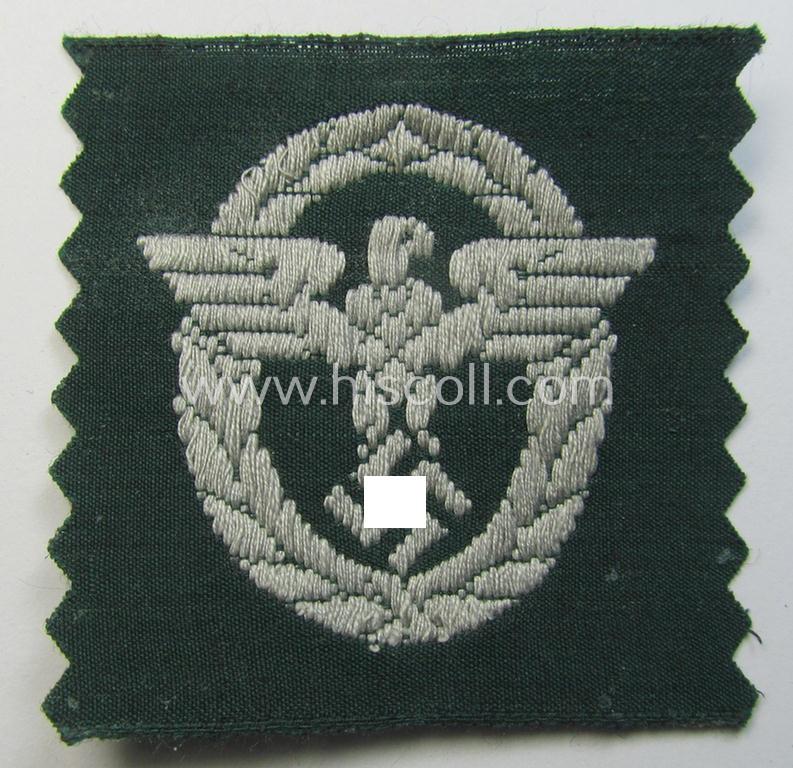 Attractive, EM/NCO-pattern, police- (ie. 'Polizei-') related cap-eagle (ie. 'Adler für Schiffchen o. Einheitsfeldmütze') being a 'virtually mint- ie. unissued' example as executed in 'BeVo'-weave-style onto a green-coloured background