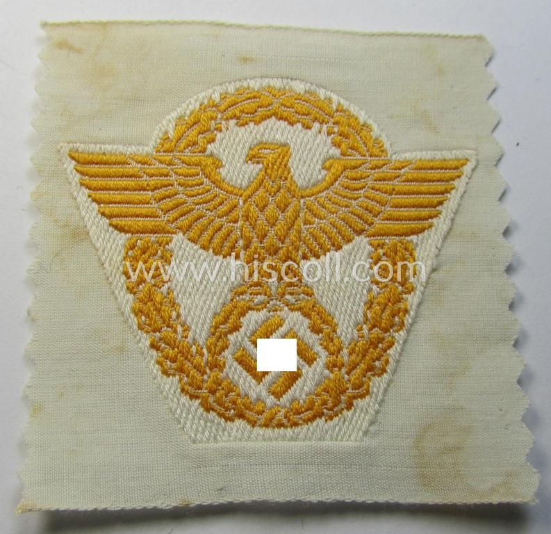 Superb, EM/NCO-pattern, police- (ie. 'Polizei-') related cap-eagle (ie. 'Adler für Schiffchen o. Einheitsfeldmütze') being a 'virtually mint- ie. unissued' example as executed in 'BeVo'-weave-style onto a beige-white-coloured background