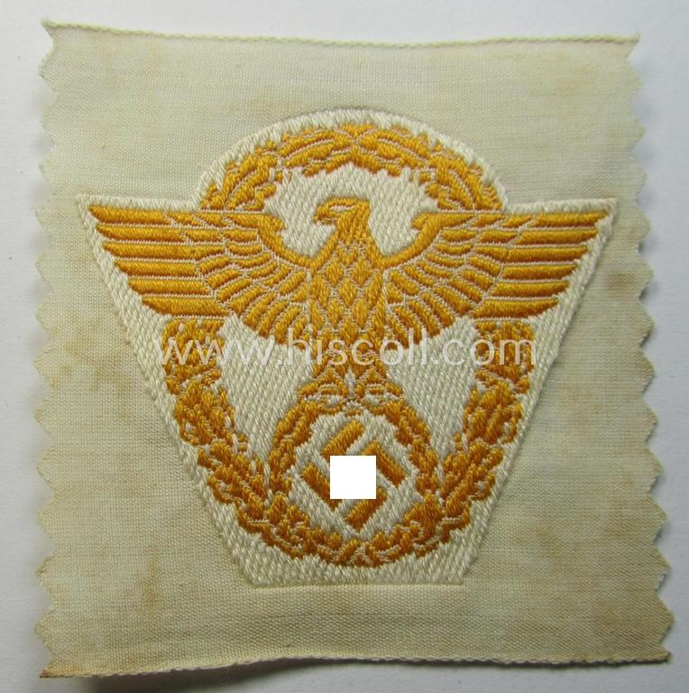 Superb, EM/NCO-pattern, police- (ie. 'Polizei-') related cap-eagle (ie. 'Adler für Schiffchen o. Einheitsfeldmütze') being a 'virtually mint- ie. unissued' example as executed in 'BeVo'-weave-style onto a beige-white-coloured background