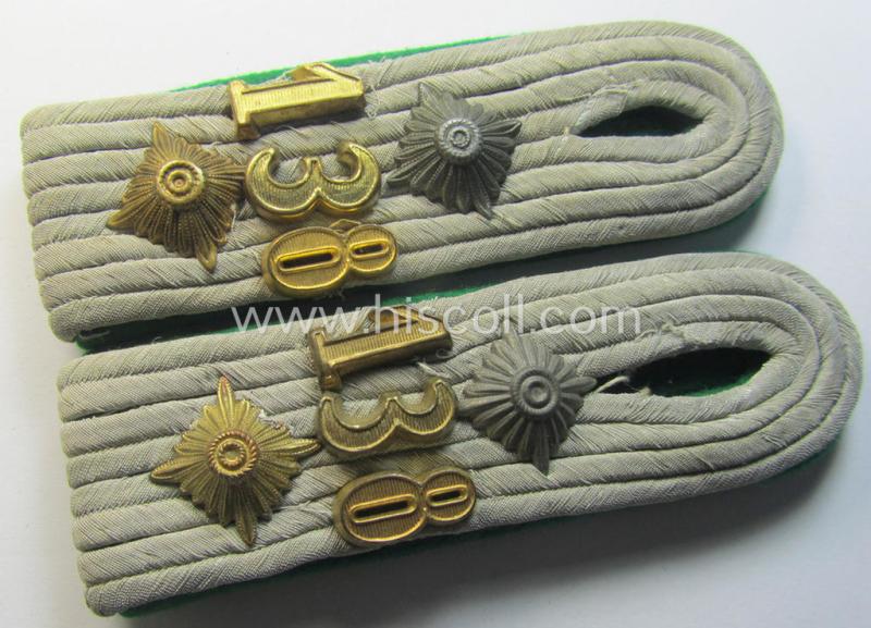 Attractive - and fully matching! - pair of WH (Heeres) neatly 'cyphered', officers'-type shoulderboards as piped in the darker-green-coloured branchcolour as was intended for usage by a: 'Hauptmann des Gebirgsjäger Regiments 138'