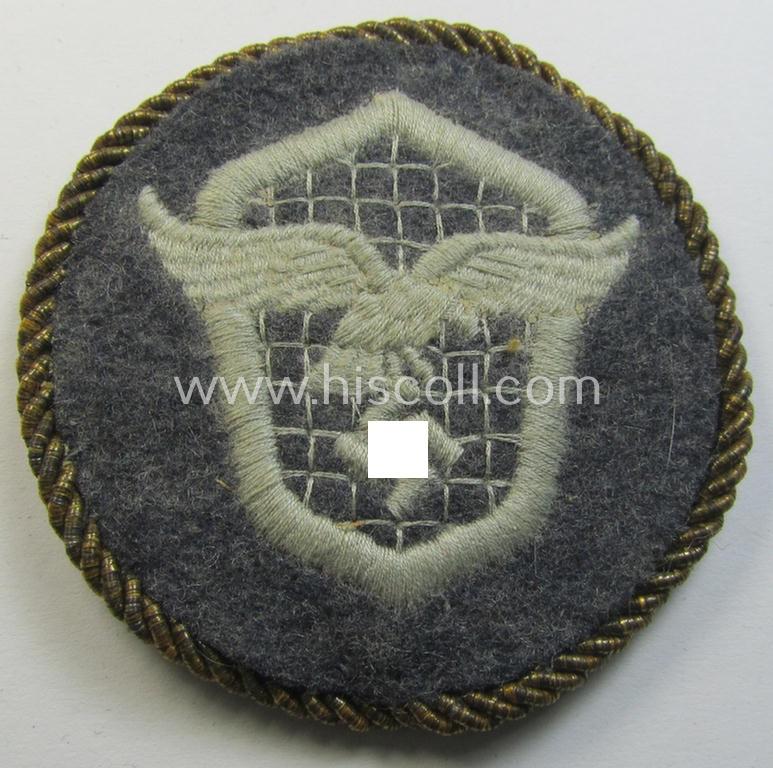WH (LW) trade- ie. special-career-patch (ie. 'Tätigkeitsabzeichen') having a golden-coloured 'Goldkordel' attached: 'LW-Kraftfahrpersonal'