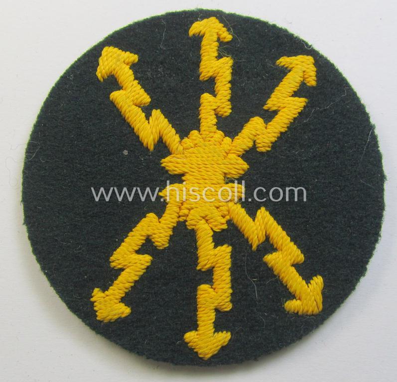 Attractive, WH (Heeres) so-called: trade- and/or special-career arm-insignia as was intended for a: 'Funkmeister' being a neatly hand-embroidered (and clearly maker-marked!) specimen on a darker-green-coloured woolen-based background