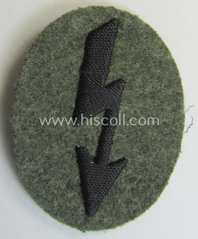 WH (Heeres) trade- and/or special-career-insignia ie. hand-embroidered 'signal-blitz' being a non-maker-marked example as executed in black linnen on a field-grey background as was specifically intended for a soldier within the: 'Pionier-Truppen'