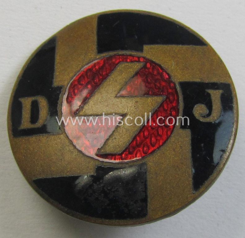 Attractive, multi-coloured- and nicely enamelled membership-lapel-pin (ie. 'Mitgliedsabzeichen' as was intended to signify membership within the: 'DJ' (or: 'Deutsches Jungvolk in der HJ') being a neat, non-maker-marked specimen of the 1st pattern