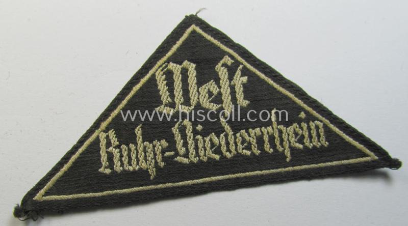 Attractive, 'HJ' ('Hitlerjugend') ie. 'BDM' ('Bund Deutscher Mädel') district-triangle (ie. 'Gebietsdreieck') entitled: 'Ruhr-Niederrhein' (being a moderately used example that is void of an 'RzM'-etiket)