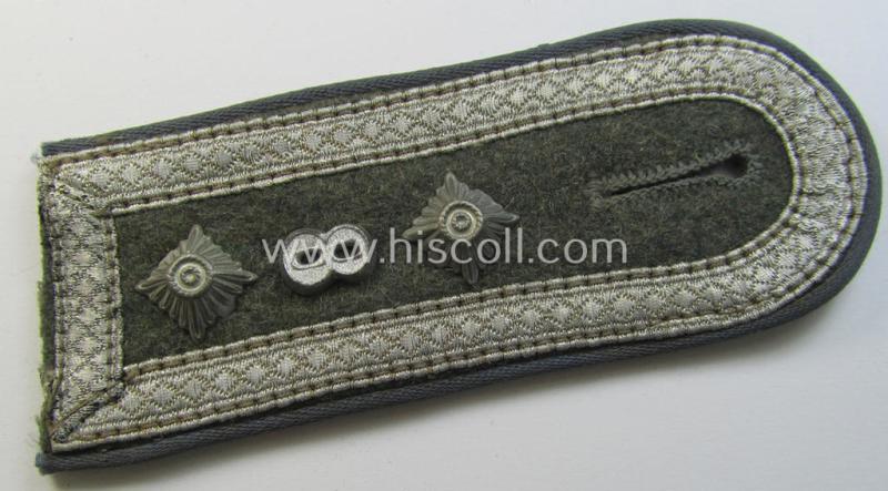 Single - I deem mid-war-period - so-called: 'M40 o. M43'-pattern, WH (Heeres) NCO-type shoulderstrap as piped in the light-blue-coloured branchcolour as was intended for usage by an: Oberfeldwebel des Nachschub-Abts. 8'