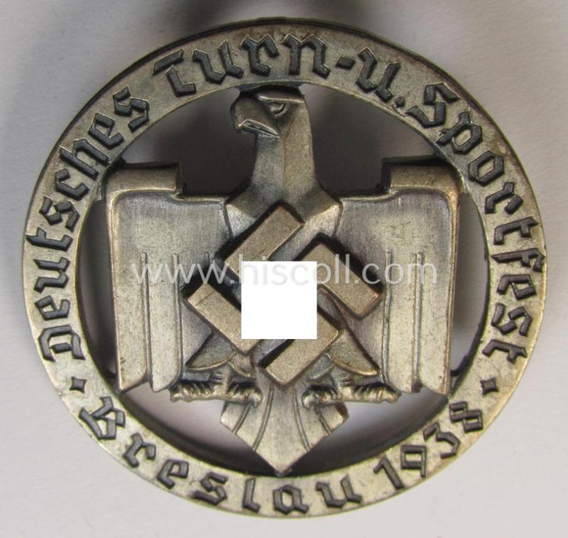 Silver-toned- and/or: 'Cupal'-based so-called: DRL- (ie. 'Deutschen Reichsbund für Leibesübungen'-) related day-badge (ie. 'tinnie' or: 'Veranstaltungsabzeichen') as issued to commemorate the: 'Deutsches Turn- u. Sportfest - Breslau - 1938'