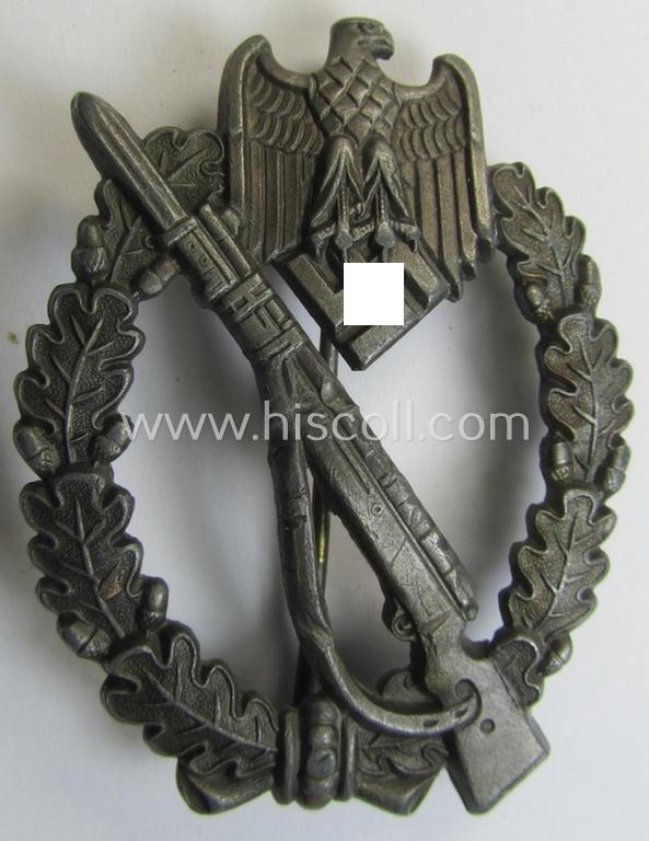 Attractive, 'Infanterie Sturmabzeichen in Bronze' being a non-maker-marked and/or typical zinc- (ie. 'Feinzink'-) based version (ie. 'crimped scooped rifle-variant') as was (I deem) procuded by the: 'S&L'- (ie. 'Steinhauer u. Lück'-) company