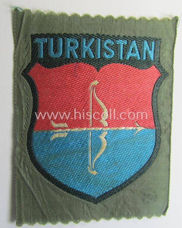 Attractive, 'BeVo'-type armshield entitled: 'Turkistan' (being of the scarcely encountered third and final pattern!) that was intended for a volunteer who served within the: 'Deutsche Wehrmacht' ie. within the: 'Turkistanisches Legion'