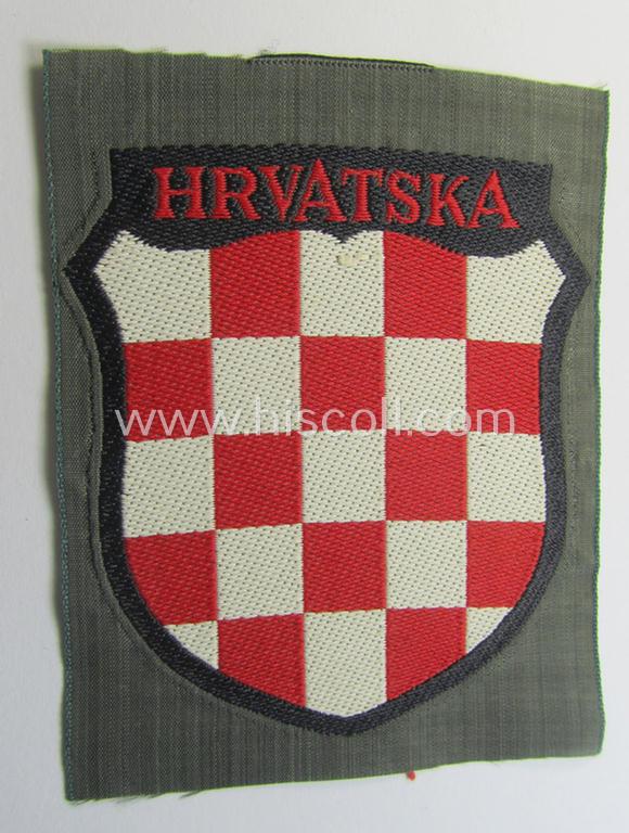 Attractive, multi-coloured- and/or 'BeVo'-woven armshield (ie. 'Ärmelschild') entitled: 'Hrvatska' as was intended for usage by a volunteer who served within the 'Deutsche Wehrmacht' ie. within the 'Kroatische Legion'