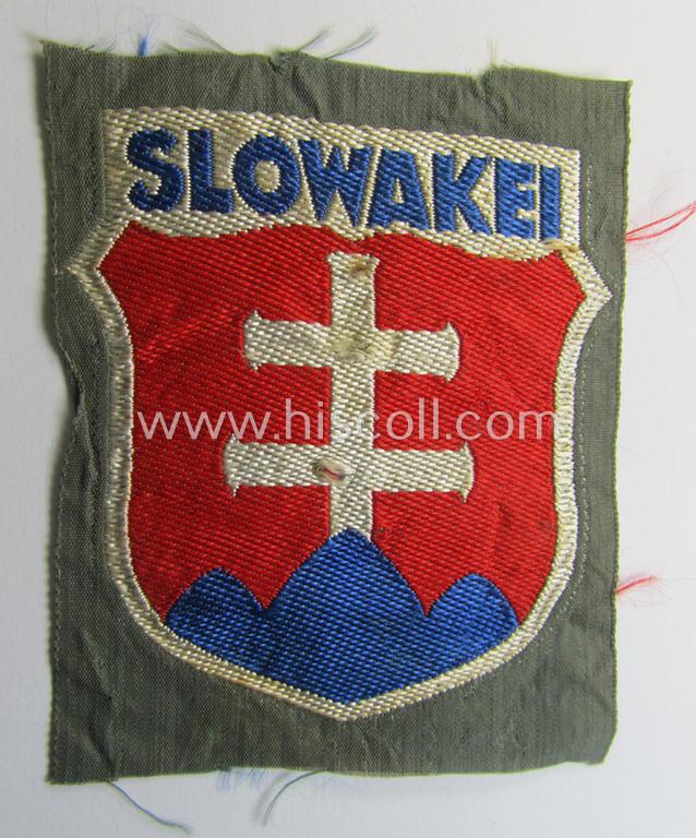 Attractive - and virtually mint- ie. unissued! - 'BeVo'-type armshield entitled: 'Slowakei' (being a piece that was intended for a volunteer who served within the: 'Deutsche Wehrmacht' ie. within the: 'Slowakisches Legion')
