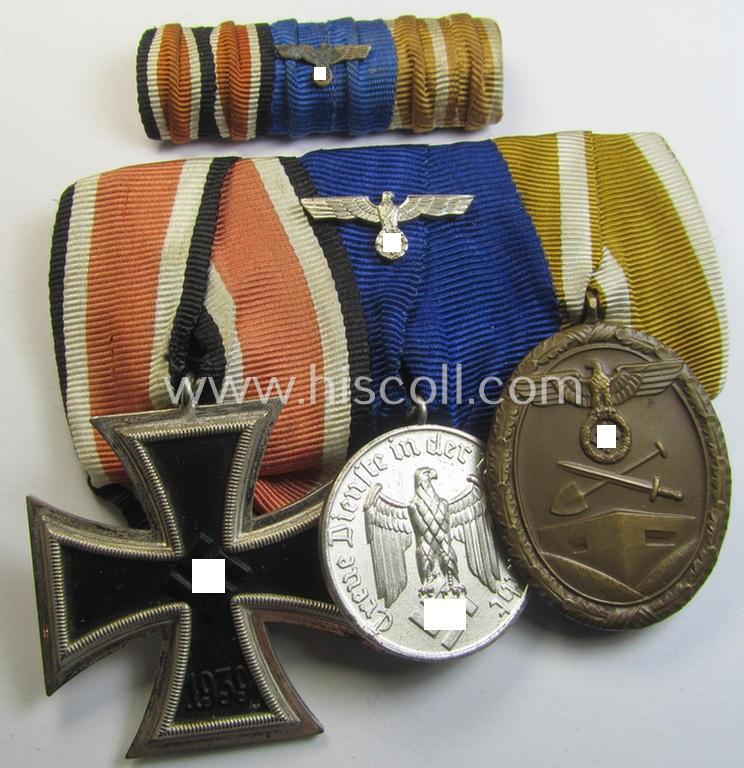 Superb, 3-pieced WWII-period medal-bar (ie. 'Ordenspange') and accompanying ribbon-bar (ie. 'Band-/Feldspange') showing resp. an: 'EKII. Kl.', a: 'WH-DA 4. Stufe' and a: 'Westwall'-medal