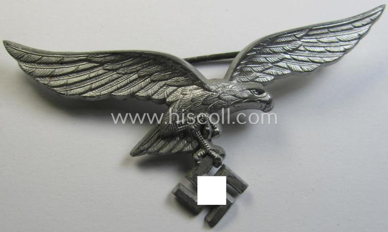 Attractive, WH (Luftwaffe) breast-eagle as was intended for usage on the white summer-tunics (ie. 'Brustadler für Sommerrock') being a detailed- and unmarked specimen as executed in silvered, zinc-based material (ie. 'Feinzink')