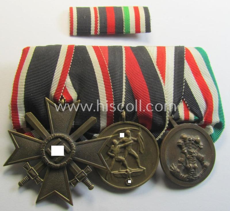 Superb, 3-pieced WWII-period medal-bar (ie. 'Ordenspange') and accompanying ribbon-bar (ie. 'Band-/Feldspange') showing resp. a: 'KvK II.Kl. m. S.', a: Czech 'Anschluss'-medal and a: 'Deutsch-Italienische Feldzugsmedaille'