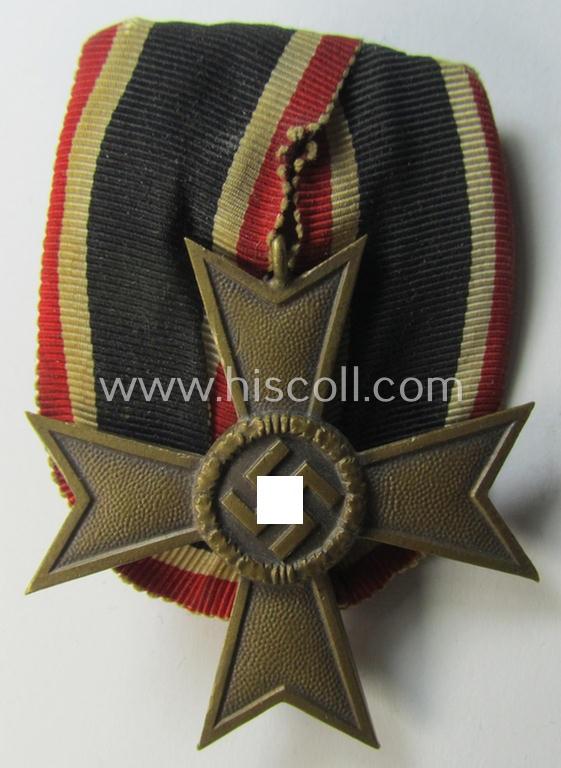 Attractive - and truly unusually seen! - golden-bronze-toned so-called: 'Einzelspange' showing a: 'Kriegsverdienstkreuz II. Klasse ohne Schw.' (or: war-merits' cross 2nd class with swords) being a very detailed- and/or 'Buntmetall'-based specimen