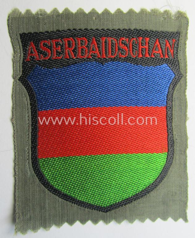 Neat, 'BeVo'-type armshield entitled: 'Aserbaidschan', being a piece as intended for a volunteer who served within the 'Deutsche Wehrmacht' ie. within the 'Aserbaidschanisches Legion'