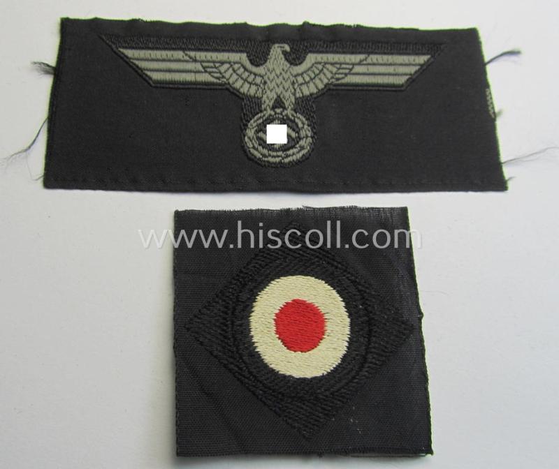 Superb, later- (ie. mid-) war-period, WH (Heeres) 'Panzer' side-cap- (ie. 'Schiffchen') eagle and dito cocarde both pieces as executed in greyish-blue-coloured linnen onto a black-coloured (and also linnen-based) background