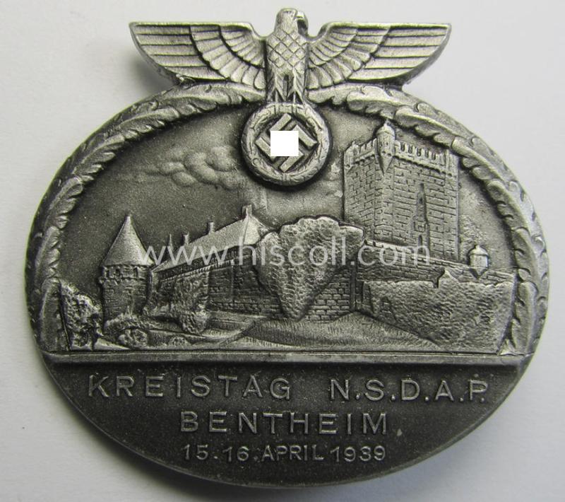 Commemorative, 'N.S.D.A.P.'-related 'tinnie' being a maker- (ie. 'Paulmann & Crone'-) marked example depicting an N.S.D.A.P.-party-eagle and towns'-view coupled with the text: 'Kreistag N.S.D.A.P. - Bentheim -15./16. April 1939'