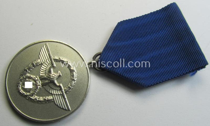 Superb, bright-silver-toned so-called: 'Polizei-Dienstauszeichnung 3. Stufe' (or: police loyal-service medal 3rd class) that comes mounted onto its period ribbon (ie. 'Bandabschnitt')
