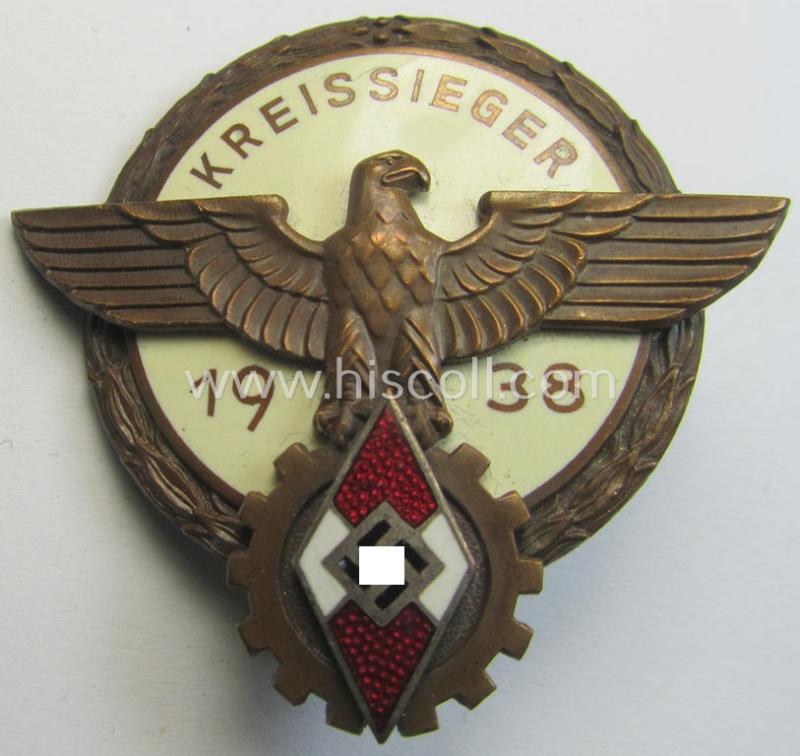 Superb, 'HJ'- ('Hitlerjugend') ie. 'BDM'- ('Bund Deutscher Mädel') related: 'Reichsberufswettkampf-Siegerabzeichen' (of the 2nd model) entitled: 'Kreissieger 1938' and being a neatly maker- (ie.: 'G. Brehmer'-) marked example