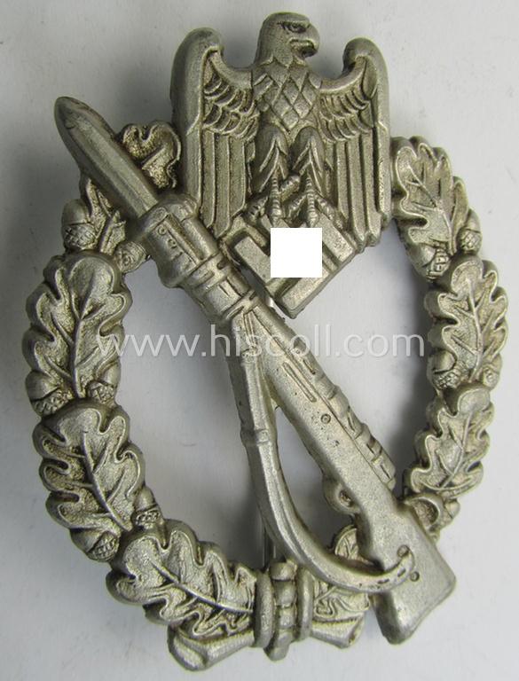 'Infanterie Sturmabzeichen in Silber' being a maker- (ie. 'Frank & Reif'-) marked and/or quite converse, 'solid-back' example by the maker: 'Frank & Reif') as was executed in bright silver-coloured, zinc-based metal