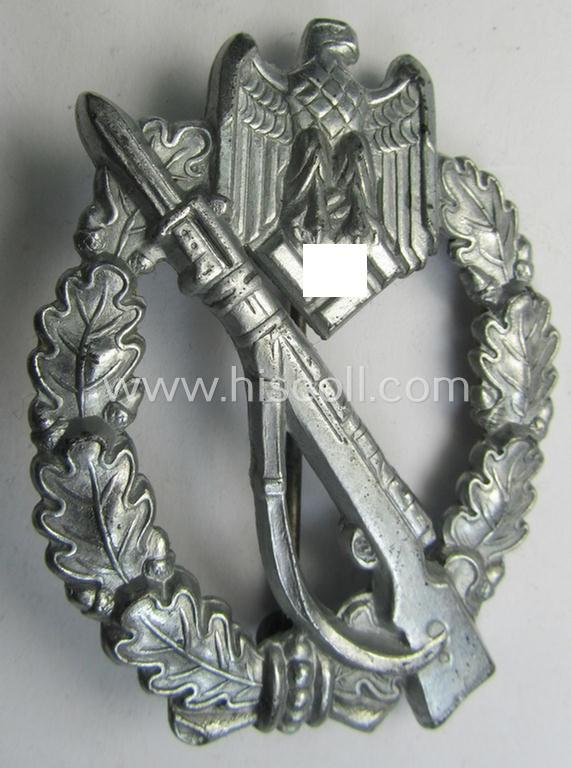 'Infanterie Sturmabzeichen in Silber' (or: silver-class infantry-assault-badge ie. IAB) being a non-maker-marked, so-called: 'solid-back'-example as was (I deem) produced by the: 'S.H.u.Co'- (ie. 'Söhni u. Heubach'-) company