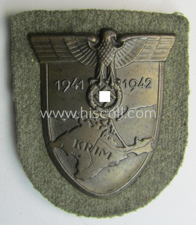Attractive - and very nicely preserved! - WH (Heeres ie. Waffen-SS) 'Krim'-campaign-shield (as was produced by a by me unidentified maker) and that comes in a presumably issued - albeit 'virtually mint', condition