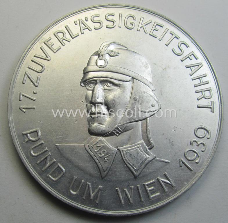 Superb, aluminium-based commemorative N.S.K.K.-related plaque (ie. 'Erinnerungs- o. nichttragbare Auszeichnungsplakette') showing an illustration of an N.S.K.K.-trooper and text: '17. Zuverlässigkeitsfahrt Rund um Wien 1939'