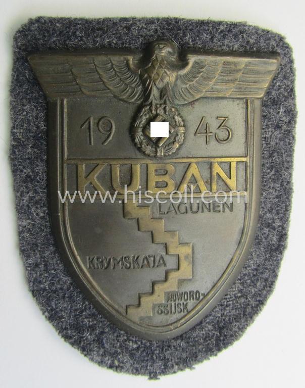Superb - and actually rarely encountered! - WH (Luftwaffe) 'Kuban'-campaign-shield that comes mounted onto its original bluish-grey-coloured- and/or woolen-based 'backing'