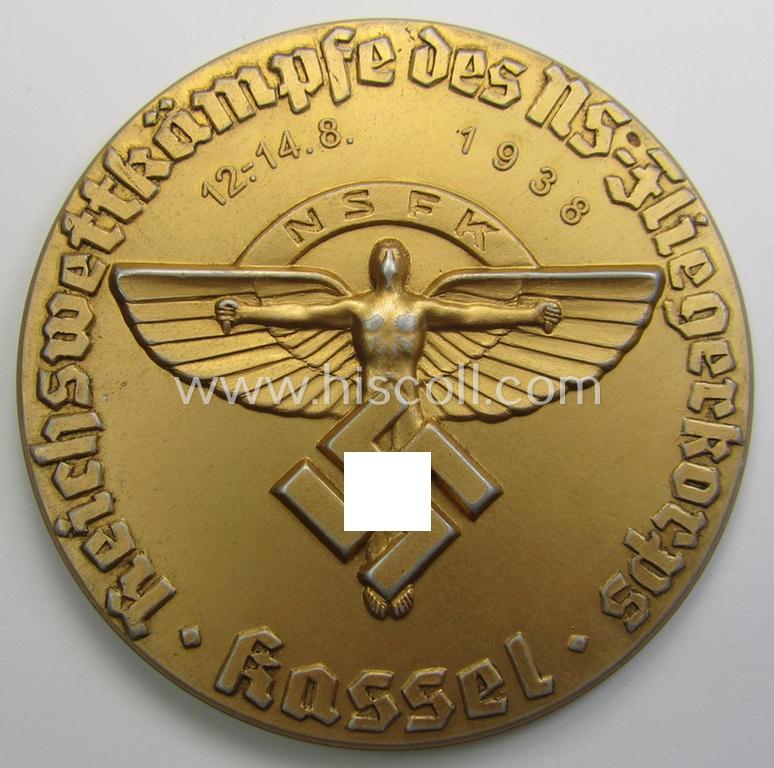 Unusual - and most certainly very decorative! - N.S.F.K.-related so-called: 'Goldene Teilnehmerplakette - Reichswettkämpfe des NS-Fliegerkorps - Kassel - 12.-14.-8-1938' being a nicely preserved example