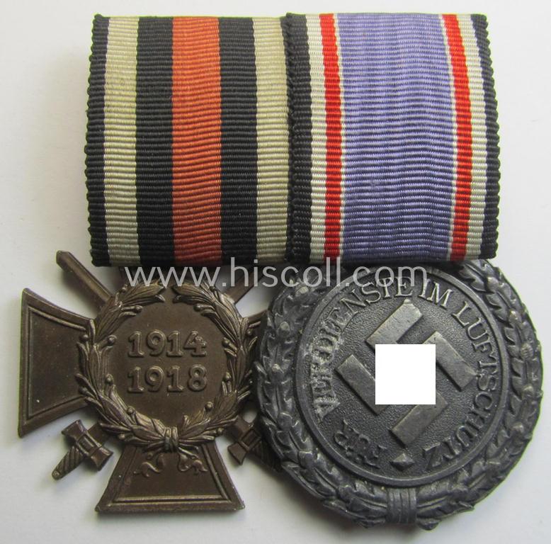 Unusually found, two-pieced (detachable!) medal-bar (ie. 'Doppelspange') respectively depicting a WWI-period: 'Frontkämpferkreuz 1914-18' (ie.: 'Kriegsteilnehmerkreuz mit Schw.') and a: 'Luftschutz-Ehrenzeichen 2. Stufe'