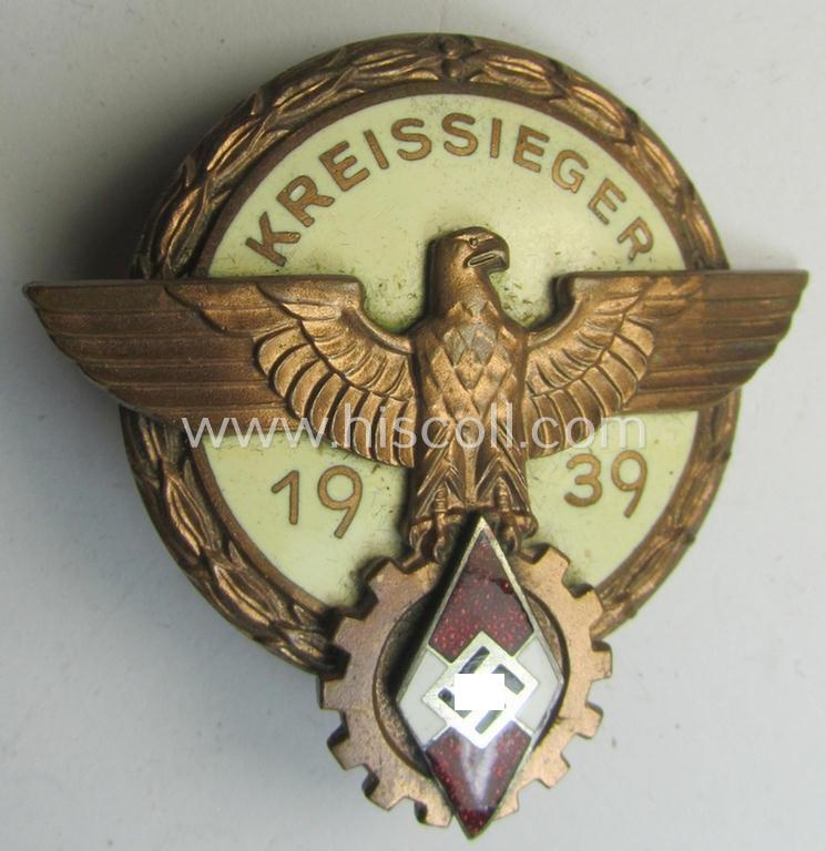 Superb, 'HJ'- ('Hitlerjugend') ie. 'BDM'- ('Bund Deutscher Mädel') related: 'Reichsberufswettkampf-Siegerabzeichen' (of the 2nd model) entitled: 'Kreissieger 1939' and being a neatly maker- (ie.: 'H. Aurich'-) marked example