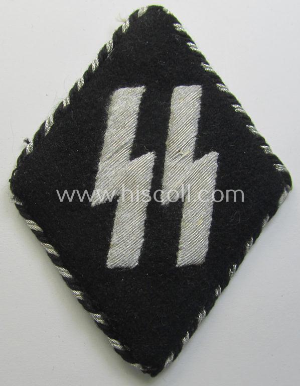Superb - and very rarely encountered! - hand-embroidered (I deem) Dutch- (ie. Flemish-) volunteer-related 'Algemene SS' (ie. black uniformed SS) so-called: 'Dienstraute' (or: in Dutch language 'mouw-embleem')