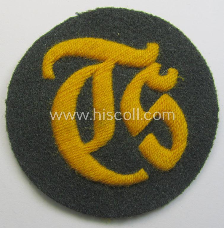 Superb - and truly rarely encountered! - WH (Heeres) hand-embroidered, trade- and/or special-career insignia (ie. 'Tätigkeitsabzeichen') as executed on a darker-green-coloured background as was specifically intended for a: 'Truppensattlermeister'