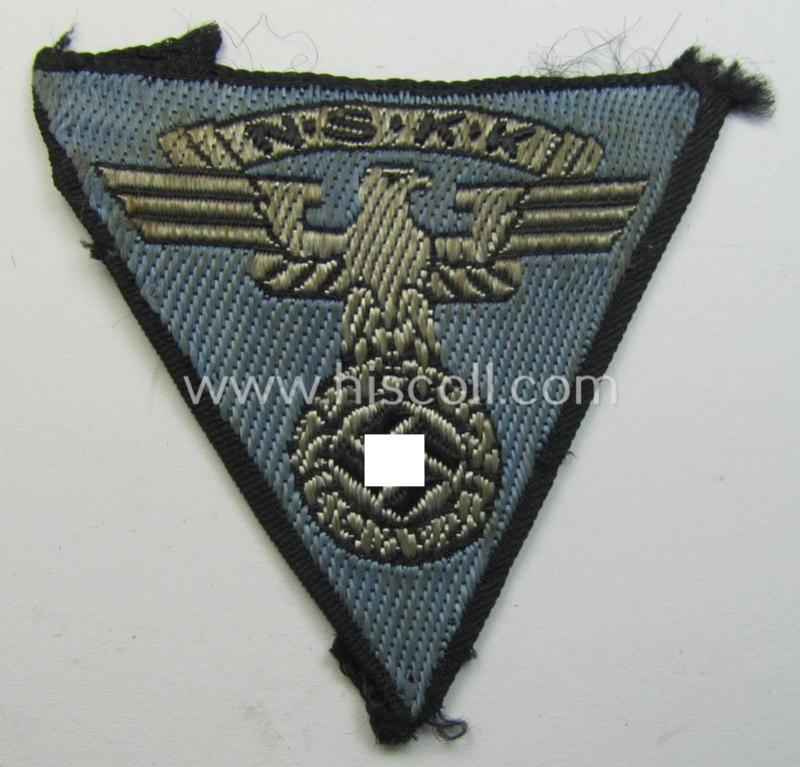 Attractive, so-called: N.S.K.K. (ie. 'National Socialistisches Kraftfahr Korps') side-cap-eagle (ie. 'Adler für N.S.K.K.-Schiffchen o. Lagermütze') being a 'flat-wire-woven'-example onto a bright-blue-coloured background