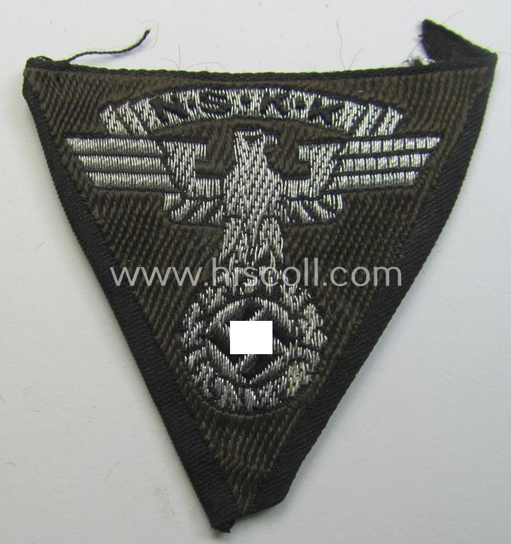 Attractive, so-called: N.S.K.K. (ie. 'National Socialistisches Kraftfahr Korps') side-cap-eagle (ie. 'Adler für N.S.K.K.-Schiffchen o. Lagermütze') being a 'flat-wire-woven'-example onto a darker-brown-coloured background