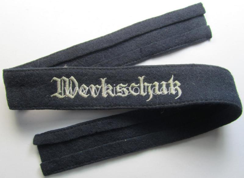 Superb - and rarely encountered! - darker-blue-cloloured so-called: 'Werkschutz o. Werksicherheitsdienst' EM- (ie. NCO-) pattern cuff-title (ie. 'Ärmelstreifen') entitled: 'Werkschutz' and that comes in a 'virtually mint- ie. unissued'-, condition
