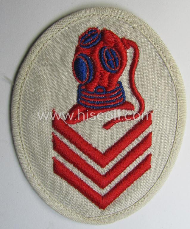 Superb - and actually rarely encountered! - WH (Kriegsmarine) neatly machine-embroidered, so-called: career- ie. specialist-armbadge (ie. 'Tätigkeits-Abzeichen') as was intended to signify the: 'Sonderausbildung für U-Boots u. Berggs.Taucher'