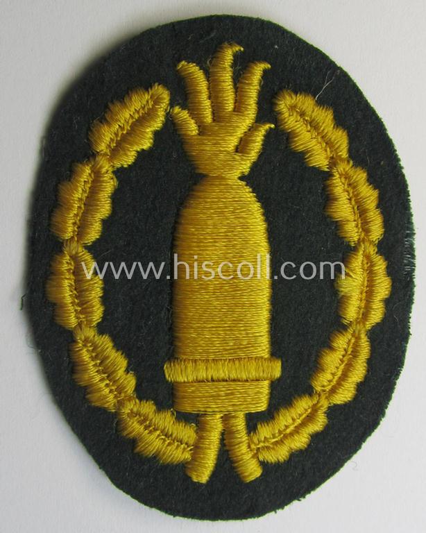 Neat, machine-embroidered, WH (Heeres) so-called: 'Richtabzeichen für Artillerie-Richtkannoniere' (or: artillery gun-layers patch) being a detailed example that comes in a never used- ie. 'virtually mint-/unissued'-, condition