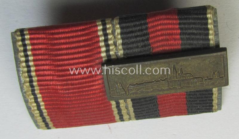 Neat, two-pieced WH (Heeres etc.) ribbon-bar (ie. 'Band- o. Feldspange') that is showing the ribbons for both an Austrian- and Czech 'Anschluss'-medal (and having a detailed miniature 'Prager Burg-Spange' period-attached)
