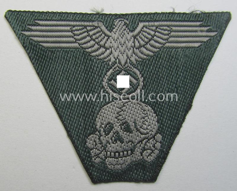 Superb - and simply never used nor cap-attached! - Waffen-SS field-grey-coloured, M43-pattern cap-trapezoid as was intended for usage on the M43-model field-caps (ie. 'Einheitsfeldmützen') that comes in a 'virtually mint- ie. unissued', condition