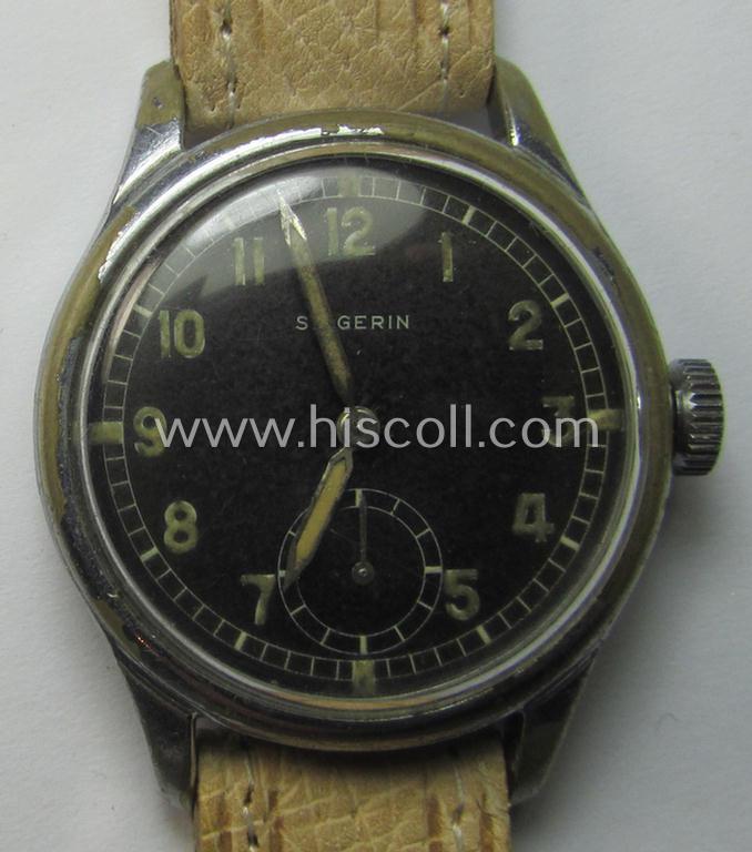 Neat - and scarcely encountered! - WH (Heeres, LW etc.) WWII-period wrist-watch (or: 'Dienstuhr') of the make: 'Siegerin' having a black-coloured dial-plate and showing a number: 'D292373' on its back (and that comes in a non-running condition)